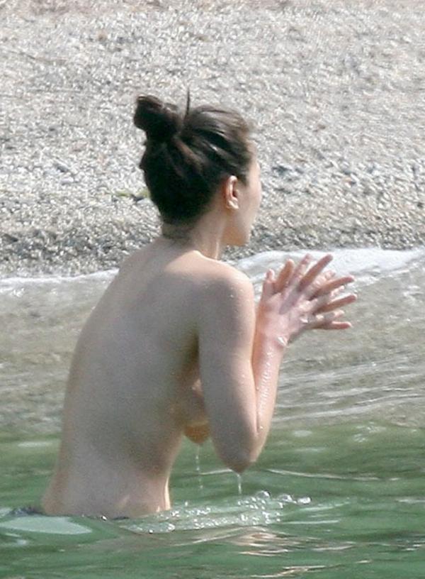 China Chow Goes Topless At The Beach Photos 9