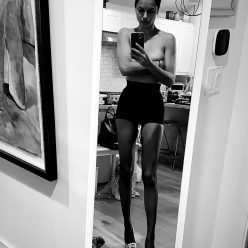 Adriana Lima Poses Topless 2 Photos