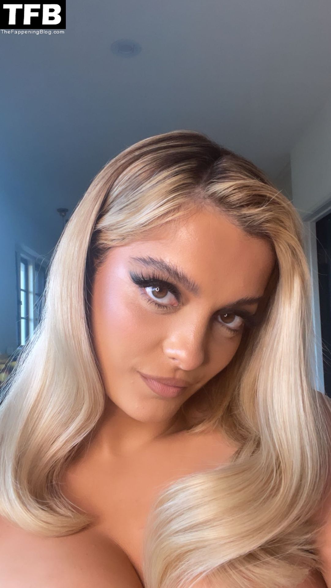 Bebe Rexha Cuts a Very Busty Frame in Blue at Paris Hilton’s Wedding Ceremony (20 Photos)