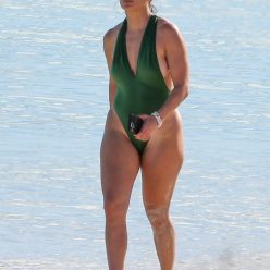 Jennifer Lopez is Pictured in a Green Swimsuit as She Soaks in the Sun in Turks and Cai