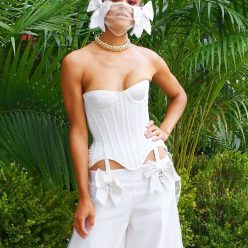 Jordan Alexander Displays Her Nice Cleavage in a White Dress at the Gossip Girl