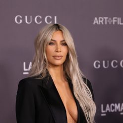 Kim Kardashian Braless 18 Photos Video