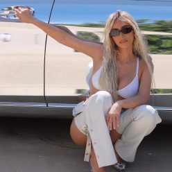 Kim Kardashian Looks Hot in a White Bikini 4 Photos