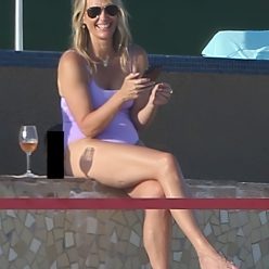 Molly Sims Slips Into a Lavender Swimsuit For a Fun Day at the Beach in Cabo 17 Photos