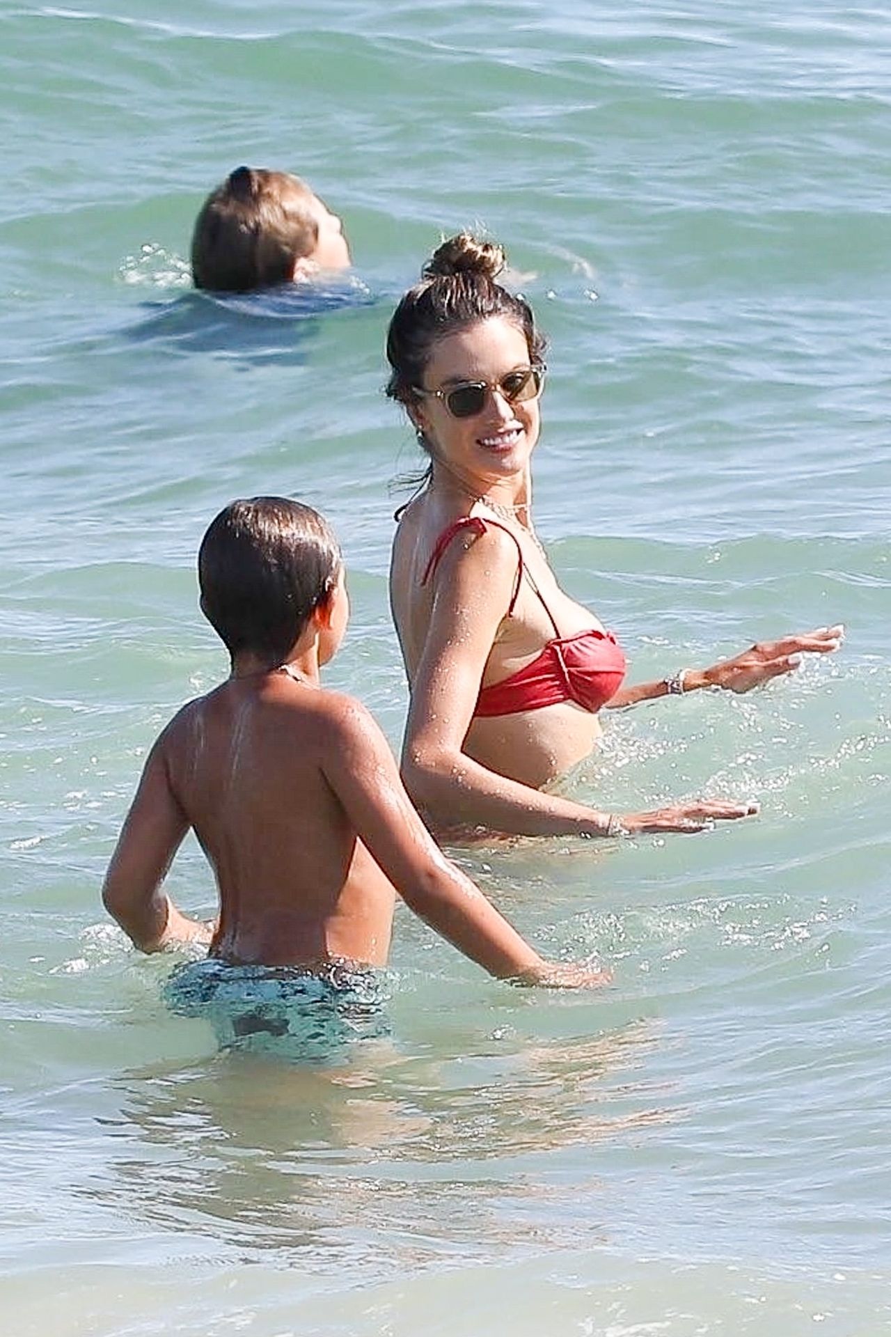 Alessandra Ambrosio Stuns in a Red Bikini While Cooling Off at the Beach (97 Photos)