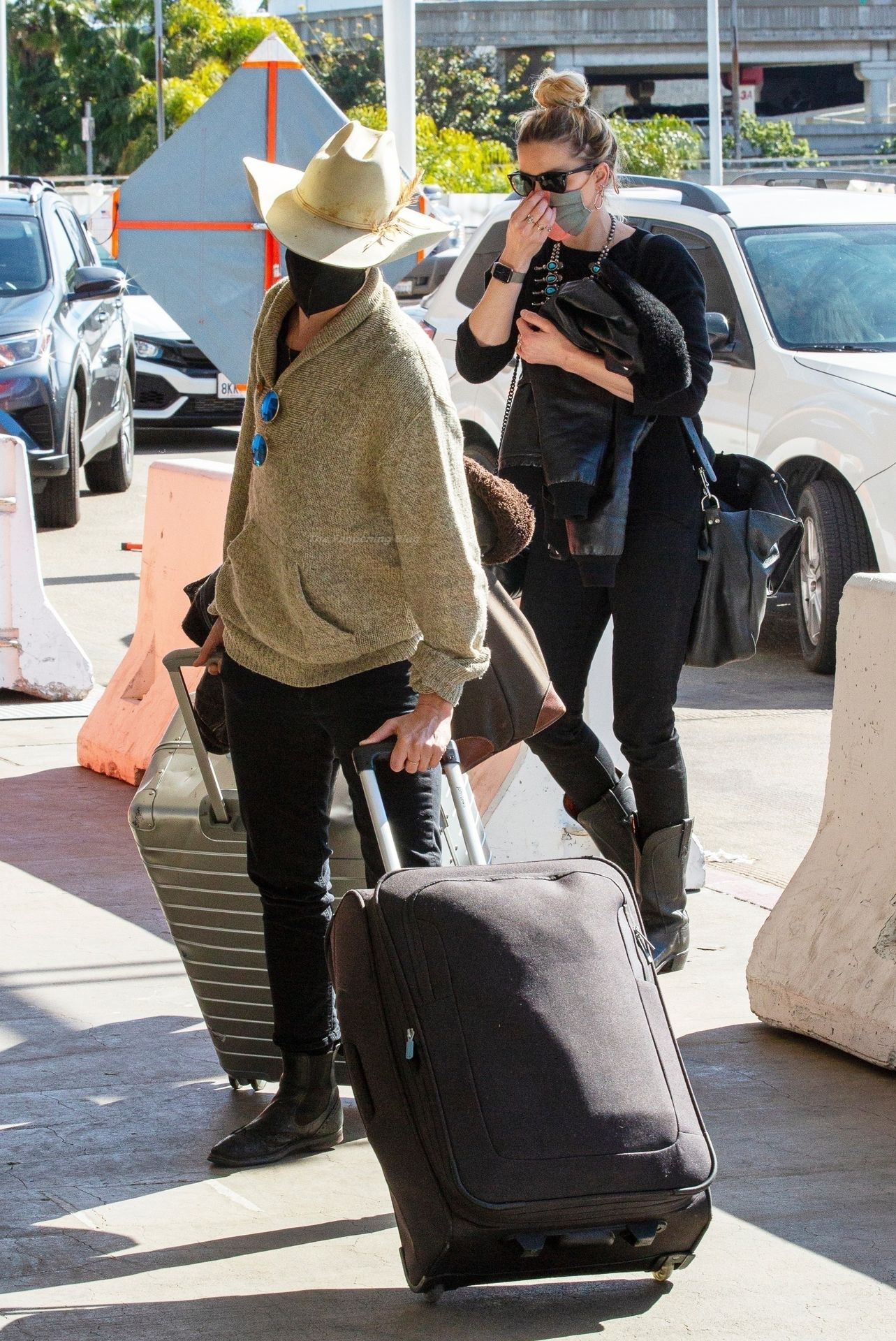 Amber Heard & Bianca Butti Fly Out of Town (37 Photos)