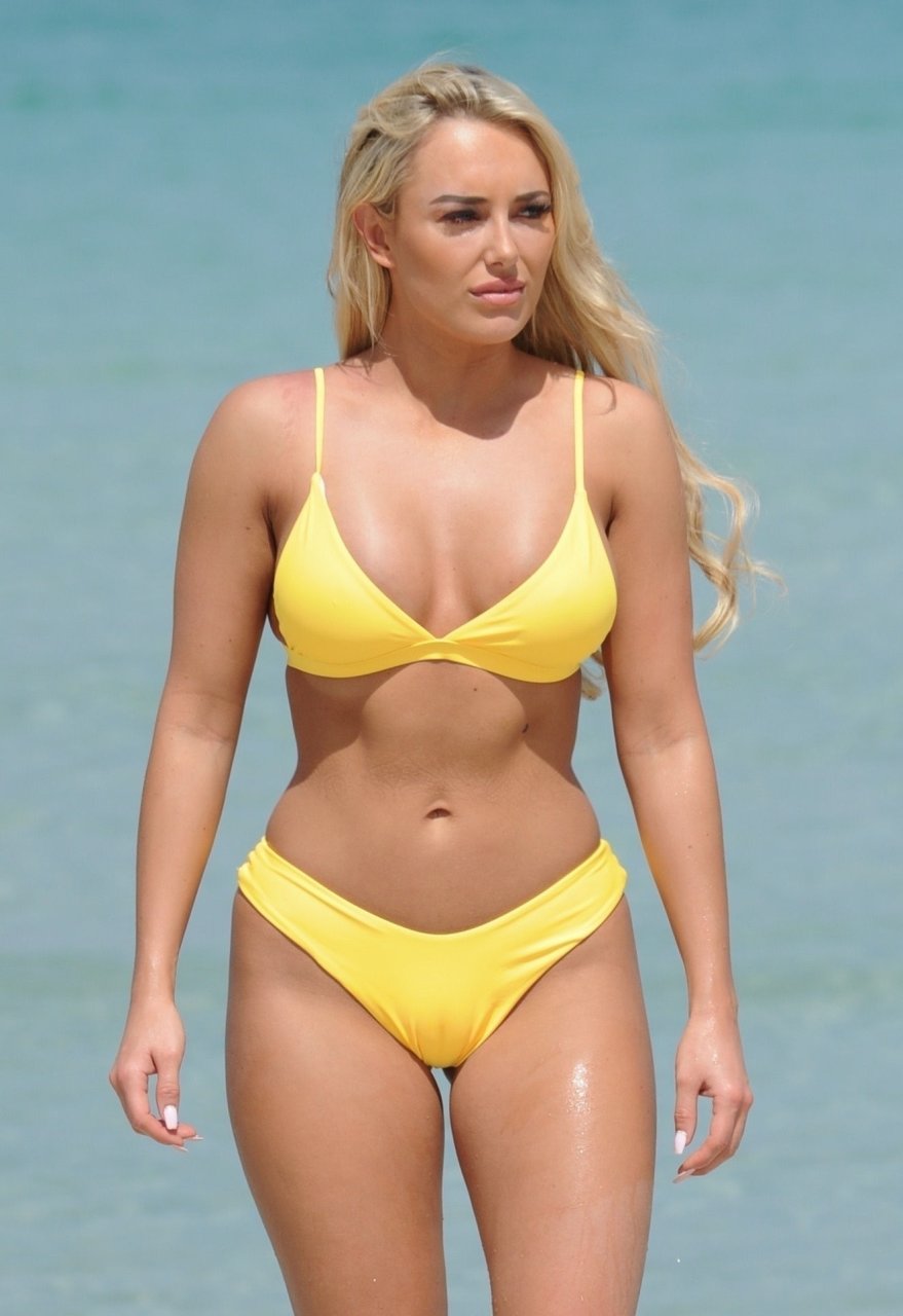 Amber Turner Shows Off Her Assets On The Beach (27 Photos)