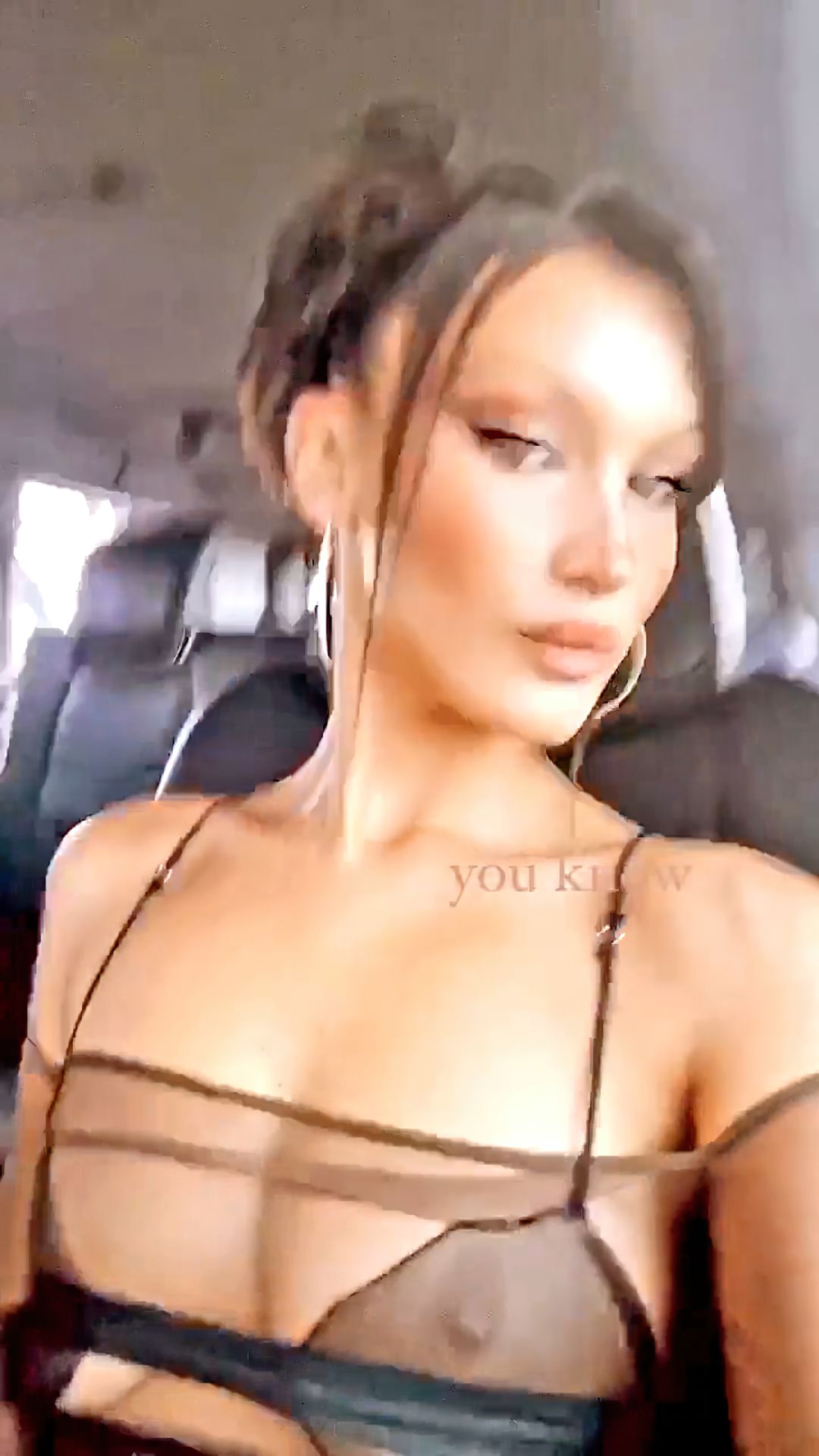 Bella Hadid Shows Off Her Tits in a Car (5 Pics + GIF & Video)