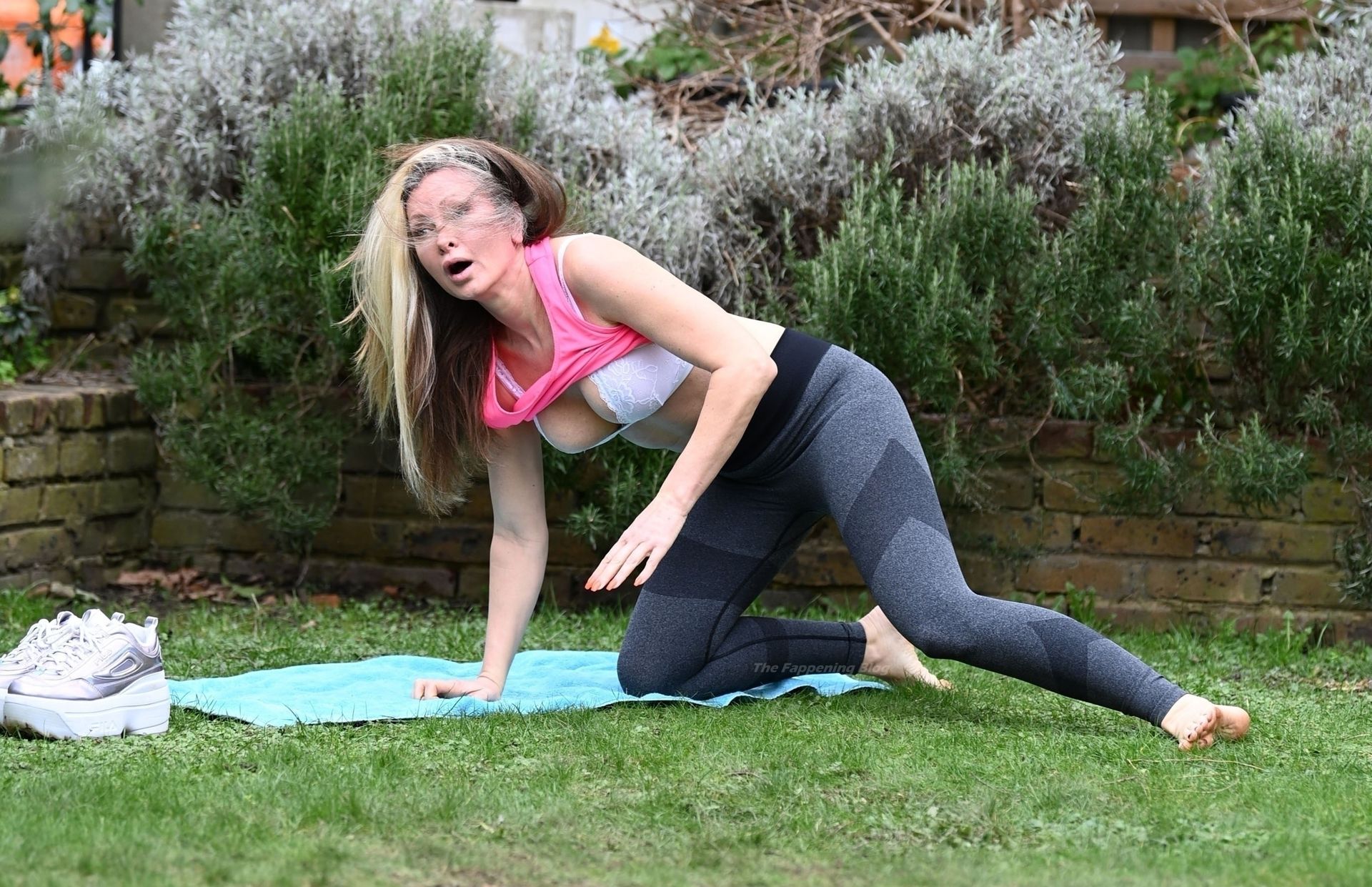 Caprice Practices the Art of Yoga at a London Park (18 Photos)