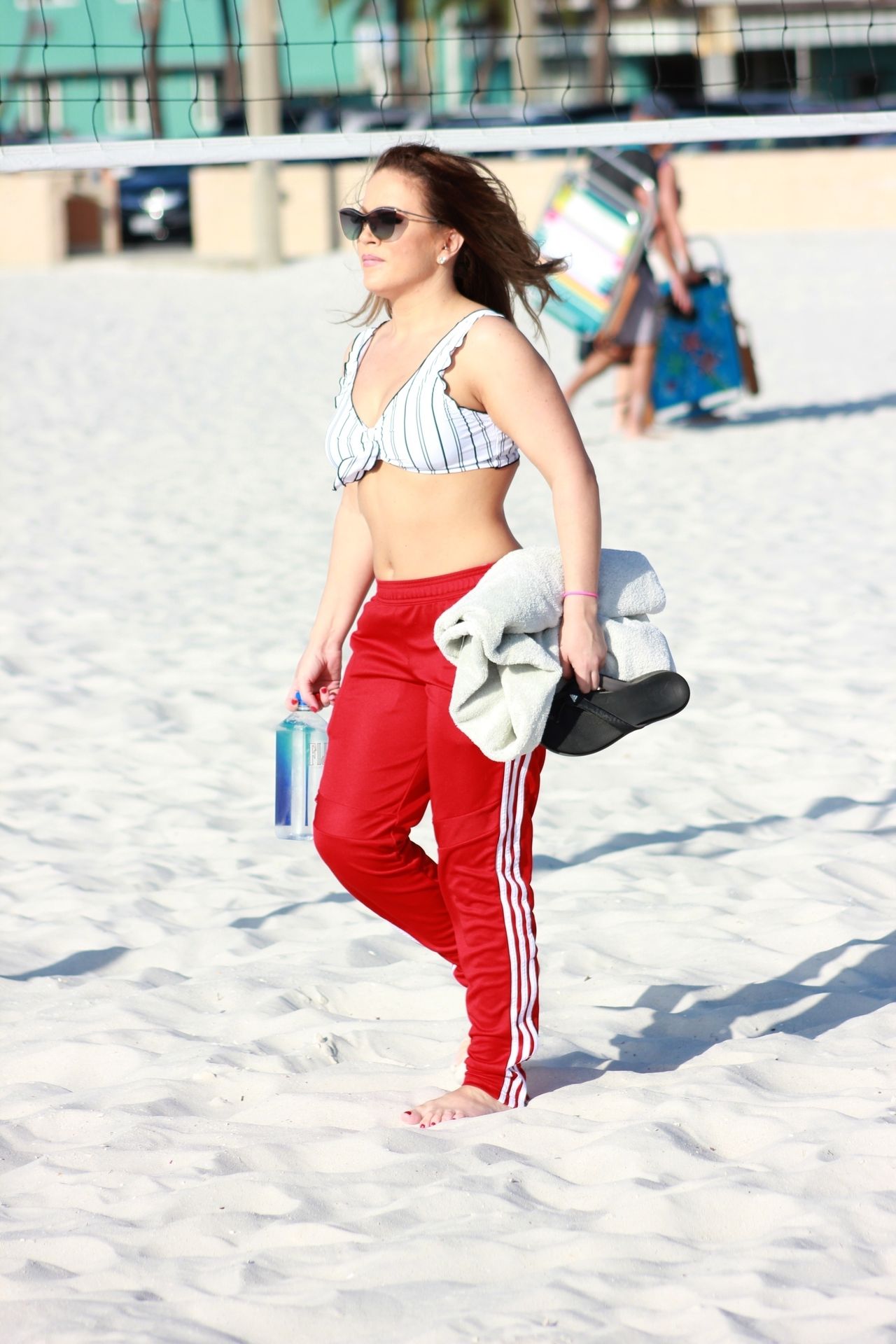 Carmen Valentina Shows Off Her Curves on the Beach (18 Photos)