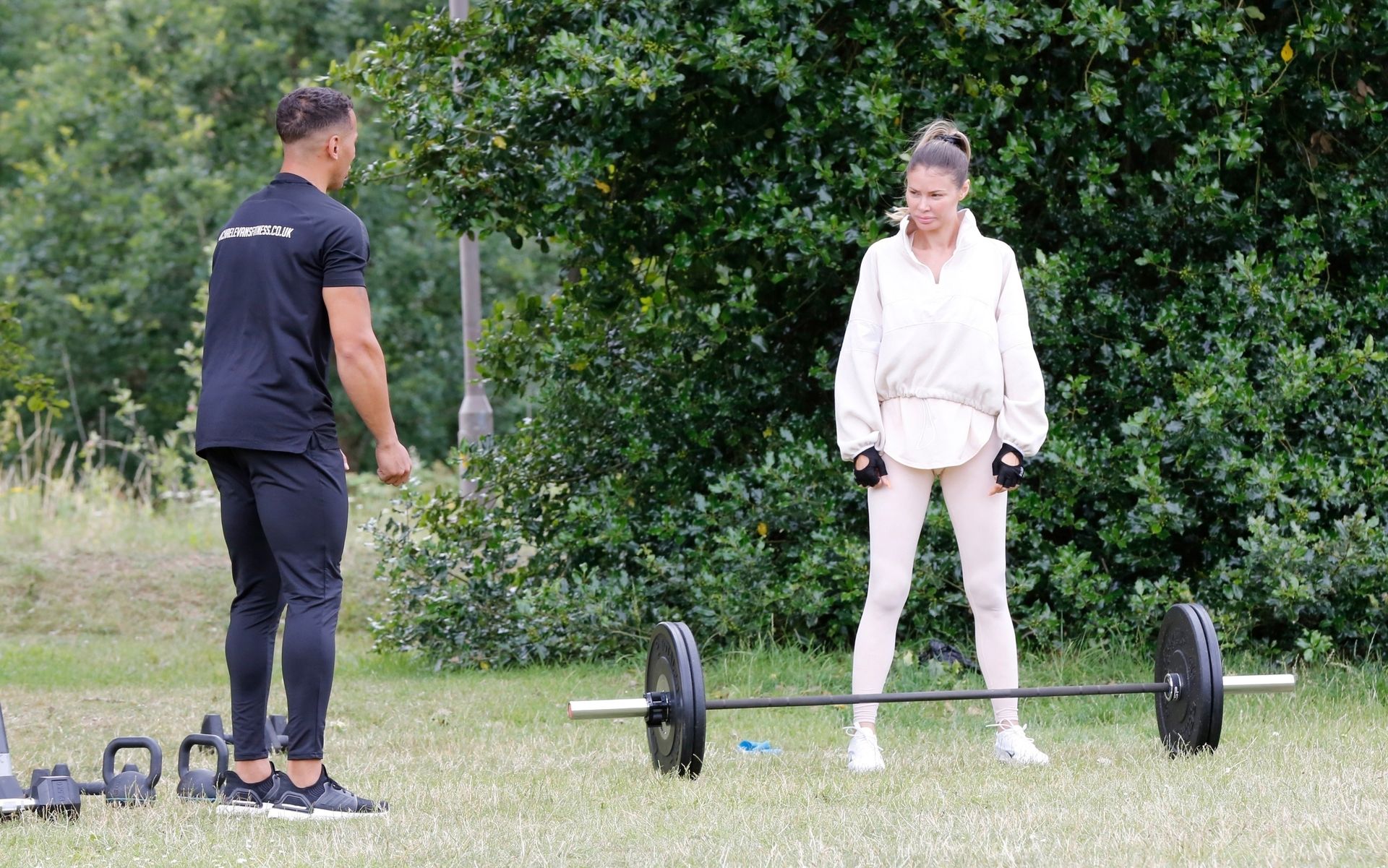 Busty Chloe Sims Works Out with Her Personal Trainer in a Park (31 Photos)