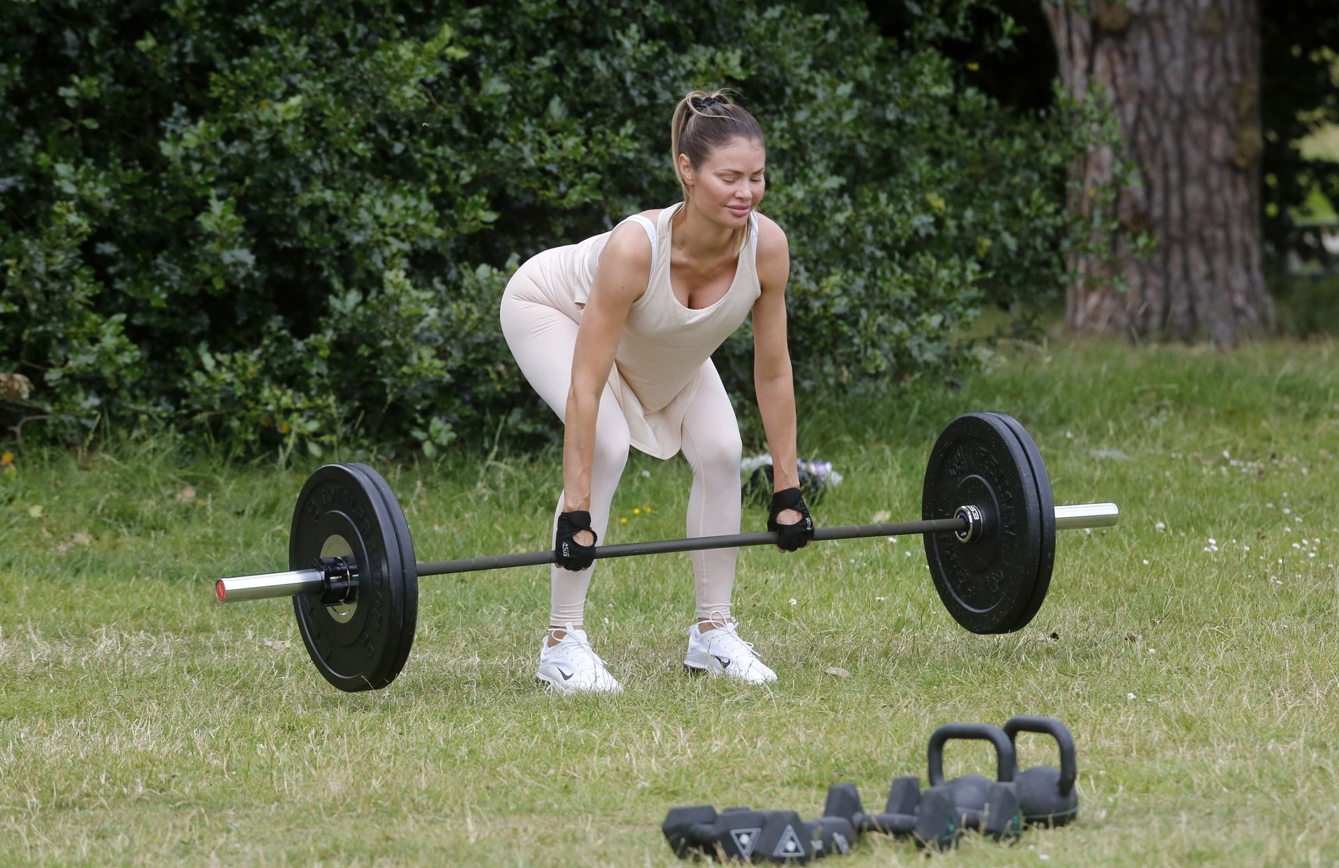 Busty Chloe Sims Works Out with Her Personal Trainer in a Park (31 Photos)