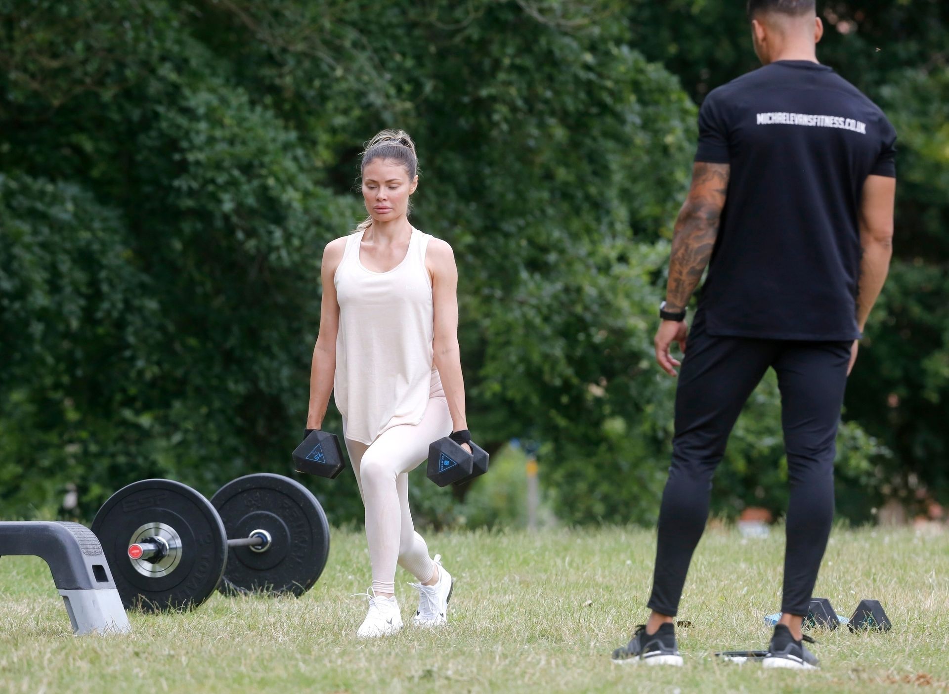Busty Chloe Sims Works Out with Her Personal Trainer in a Park (31 Photos)