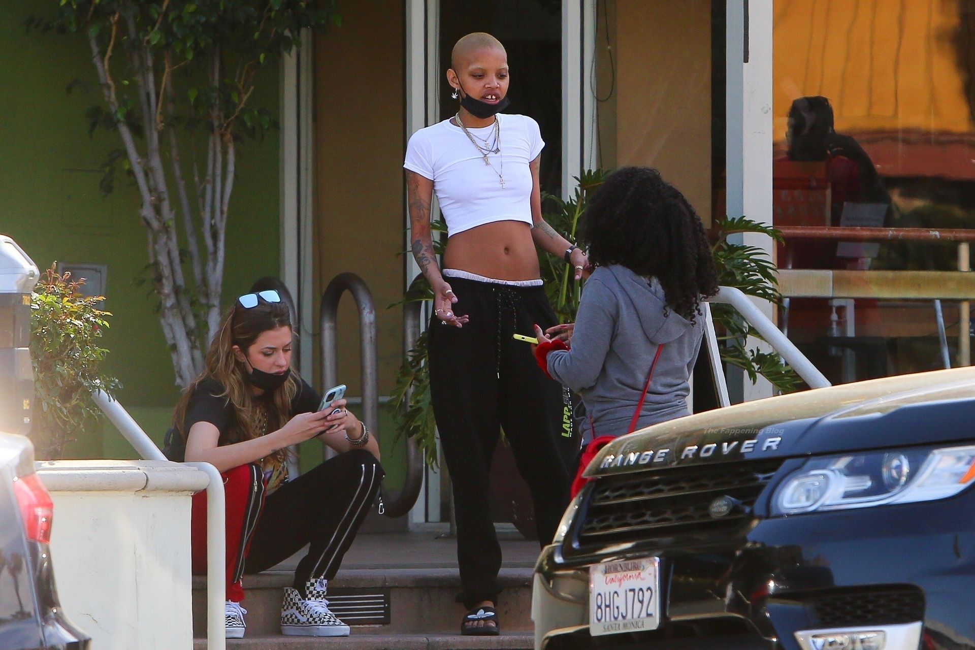 Braless Slick Woods is Pictured Socializing with Friends (22 Photos)
