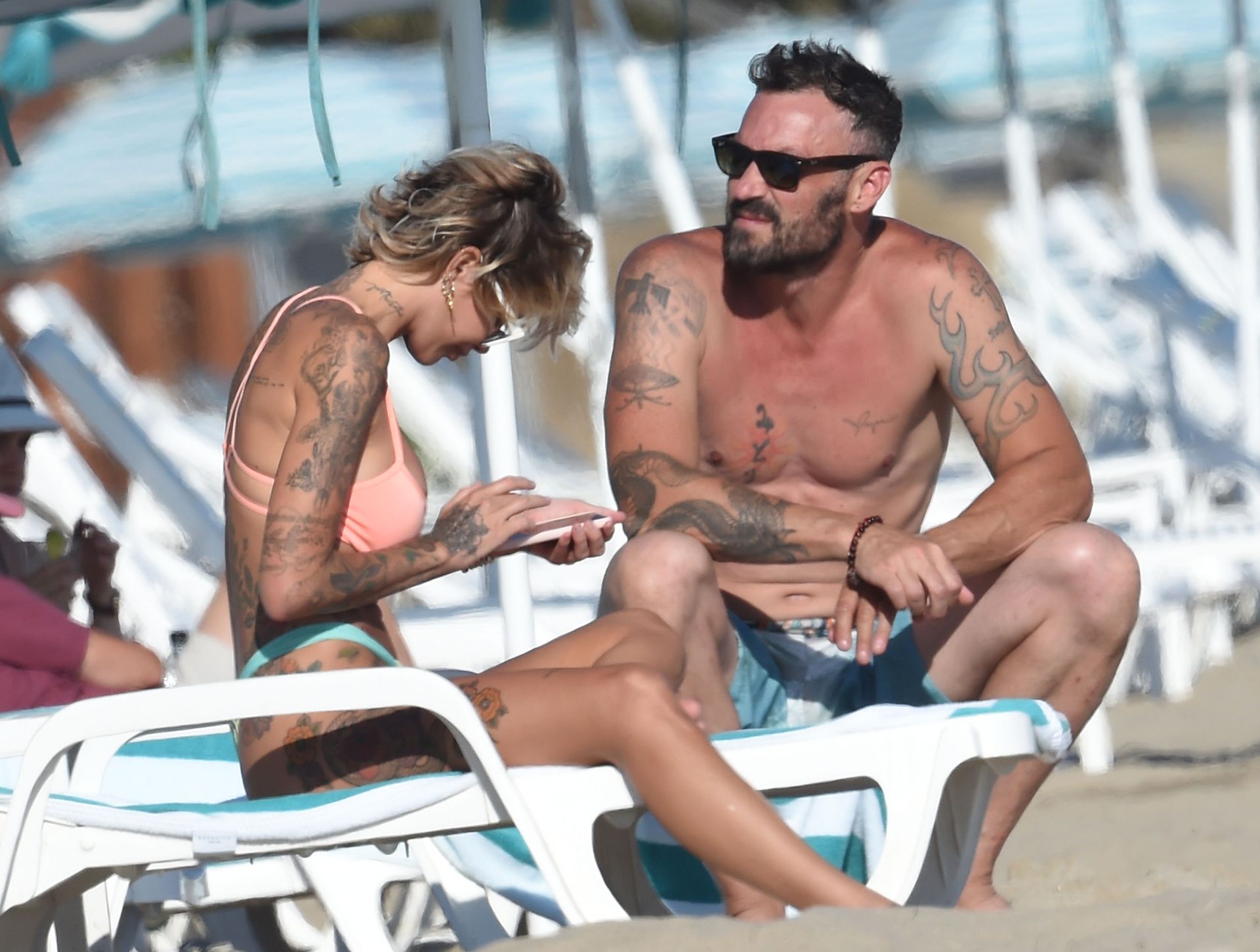 Brian Austin Green & Tina Louise Get Into Their Swimsuits for a Beach Date (33 Photos)