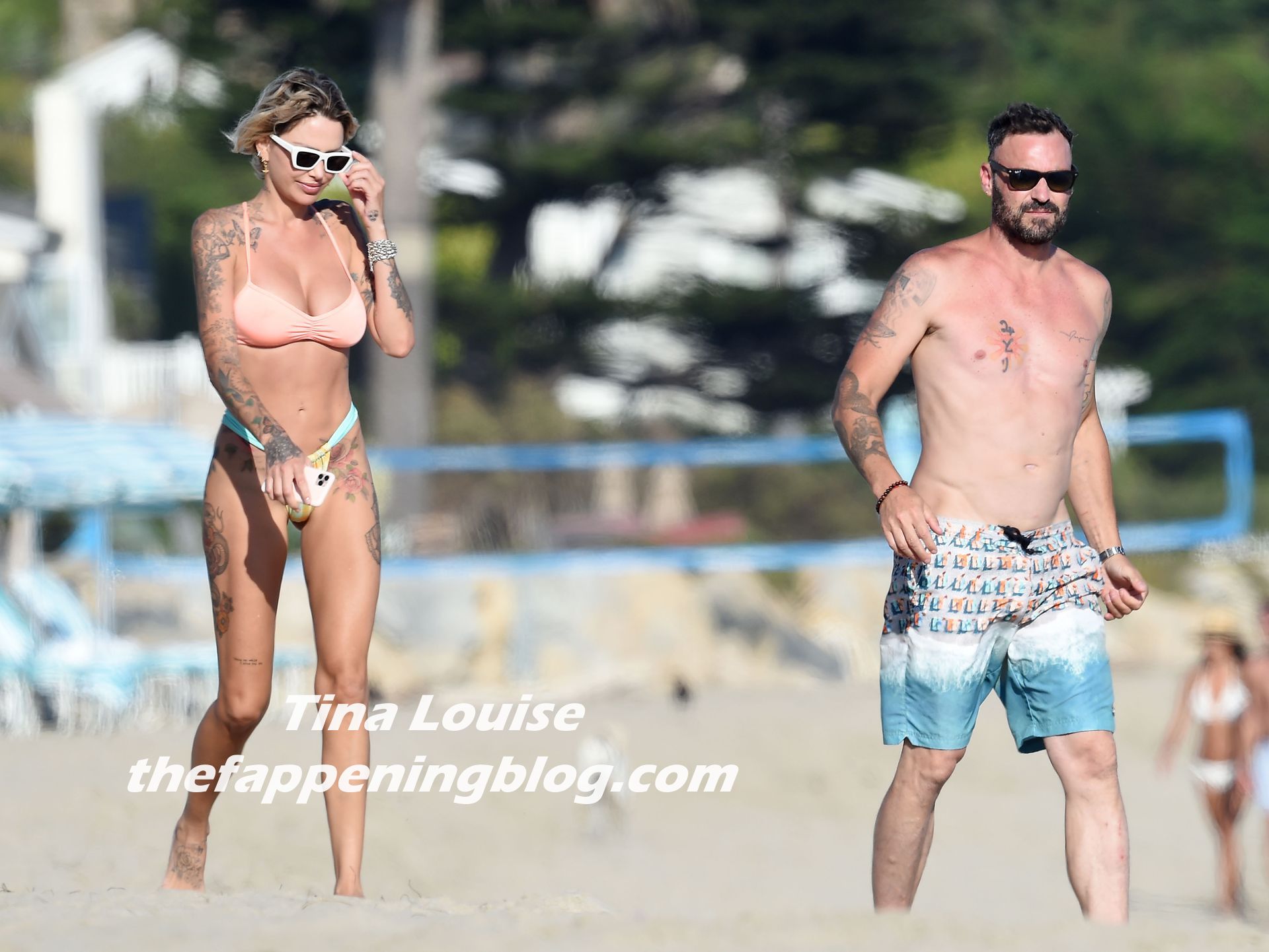 Brian Austin Green & Tina Louise Get Into Their Swimsuits for a Beach Date (33 Photos)