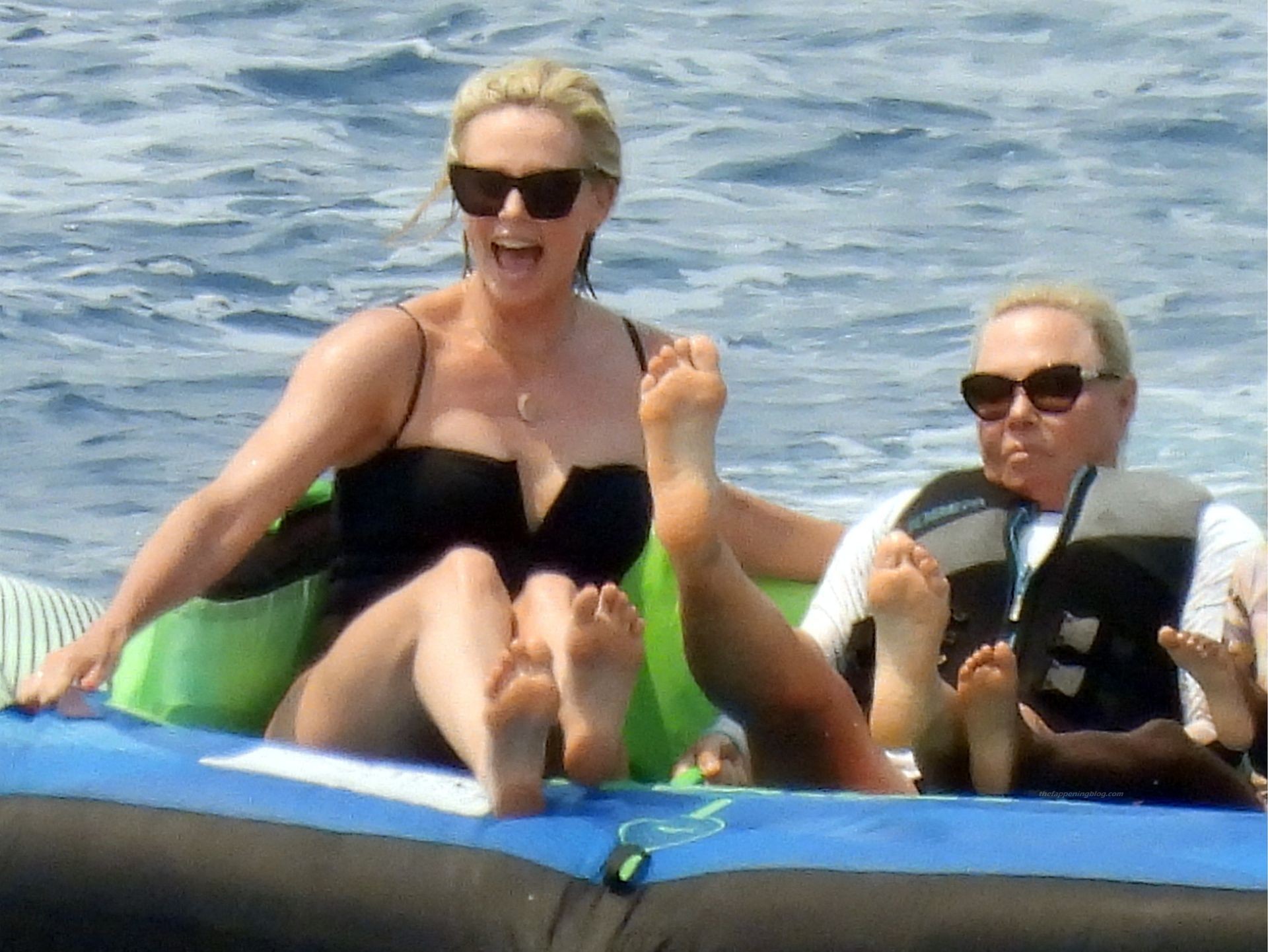 Charlize Theron Enjoys A Boat Trip With Her Daughters (32 Photos)