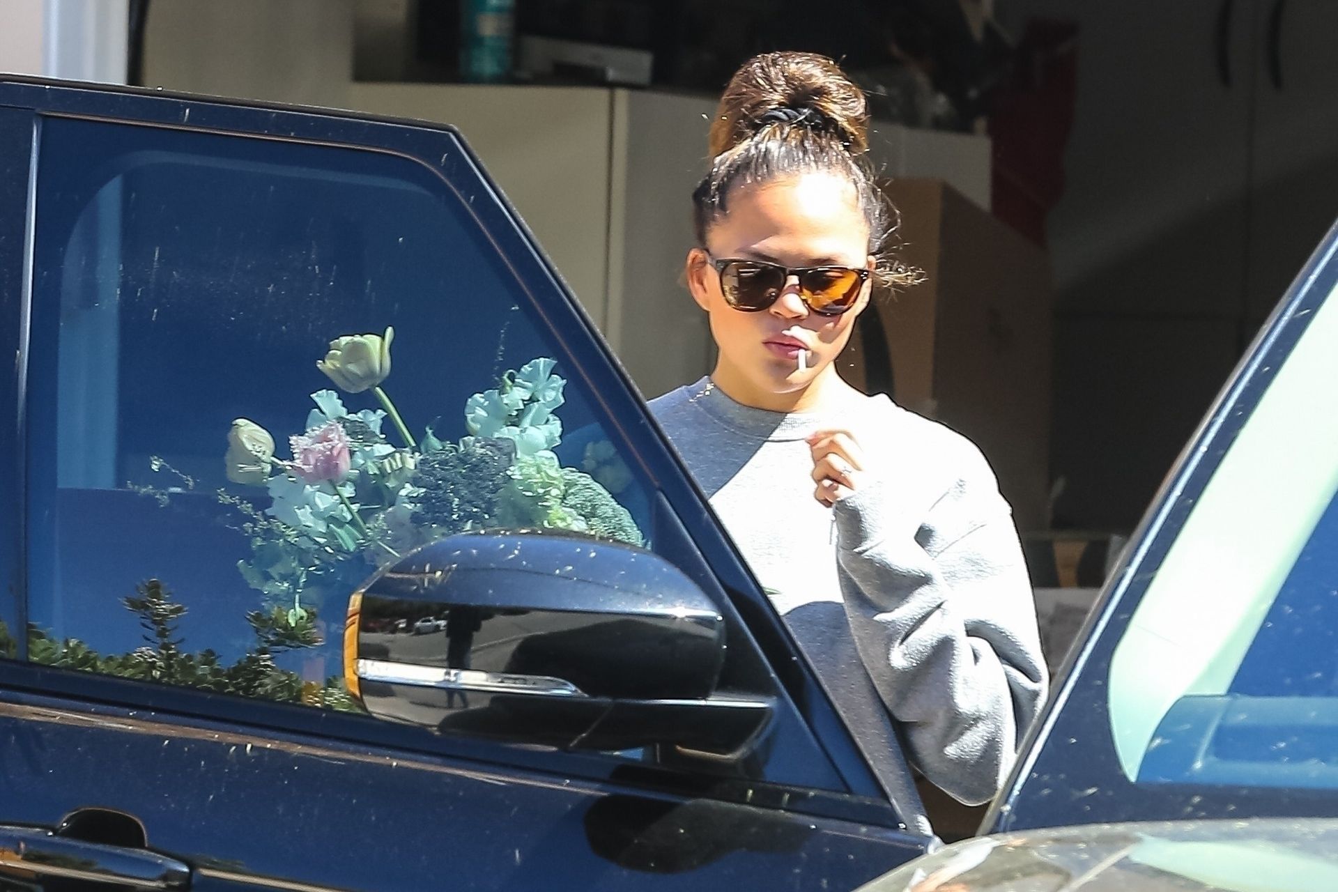 Chrissy Teigen Tweets About Helping The Paparazzi! Gives Them Donuts  Pictures! (28 Photos)