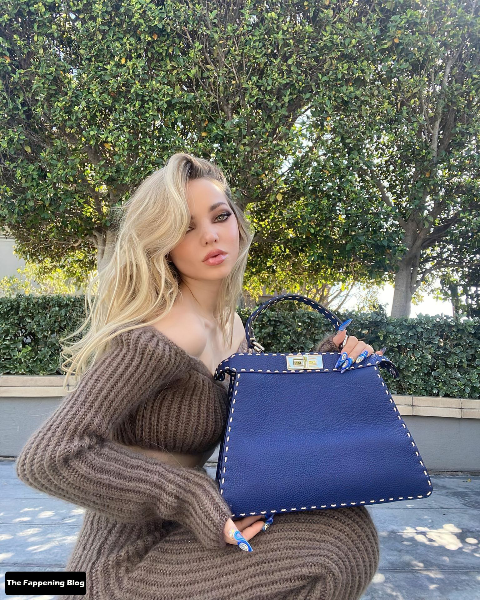Dove Cameron Looks Beautiful as She Poses Braless for Fendi (8 Photos)