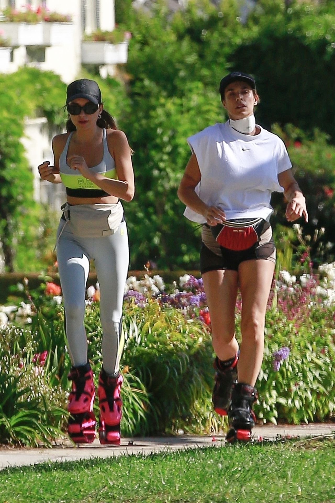 Elisabetta Canalis Hops Around Town with a Friend on Kangoo Jumps (31 Photos)