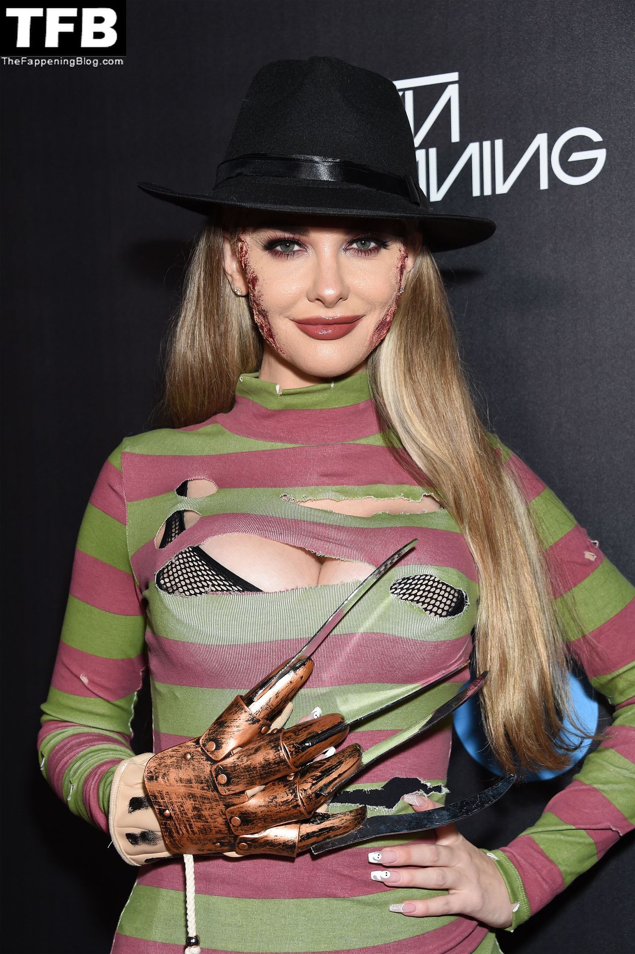 Emily Sears Cosplays Freddy Krueger at Halloween Party (7 Photos)