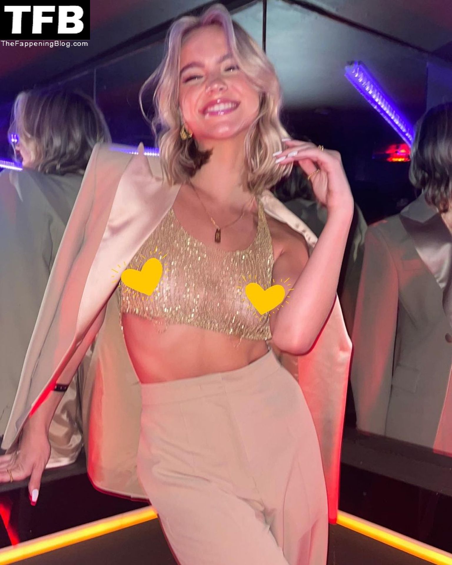 Emma Brooks Flashes Her Nude Tits in a See-Through Top at the Party in New York (6 Photos)