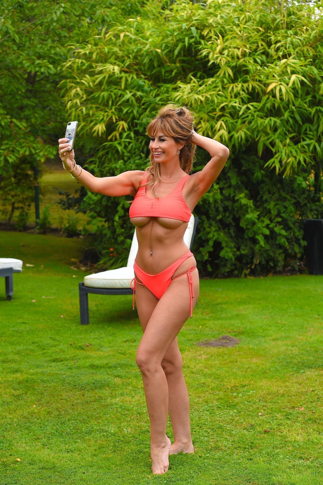 Ester Dee Shows Off Her Incredible Body in an Orange Bikini (10 Photos)