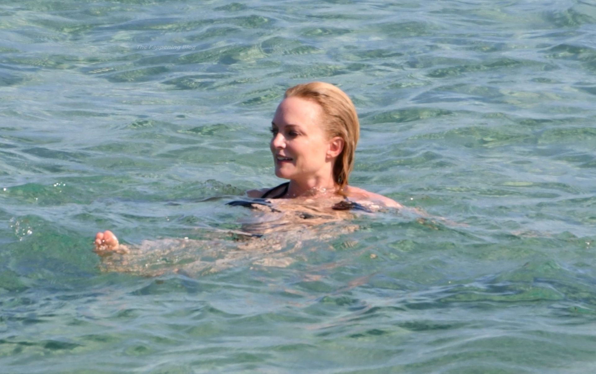Heather Graham Puts On a Black Bikini Show Out On Her Holiday in Sardinia (18 Photos)