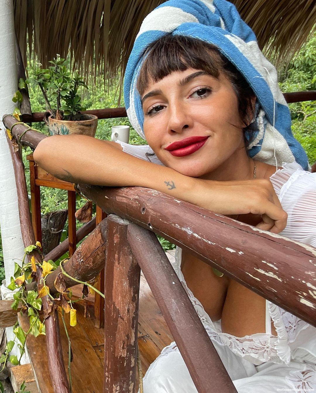 Jackie Cruz Shows Her Sexy Legs and Tits in a White Dress (5 Photos)