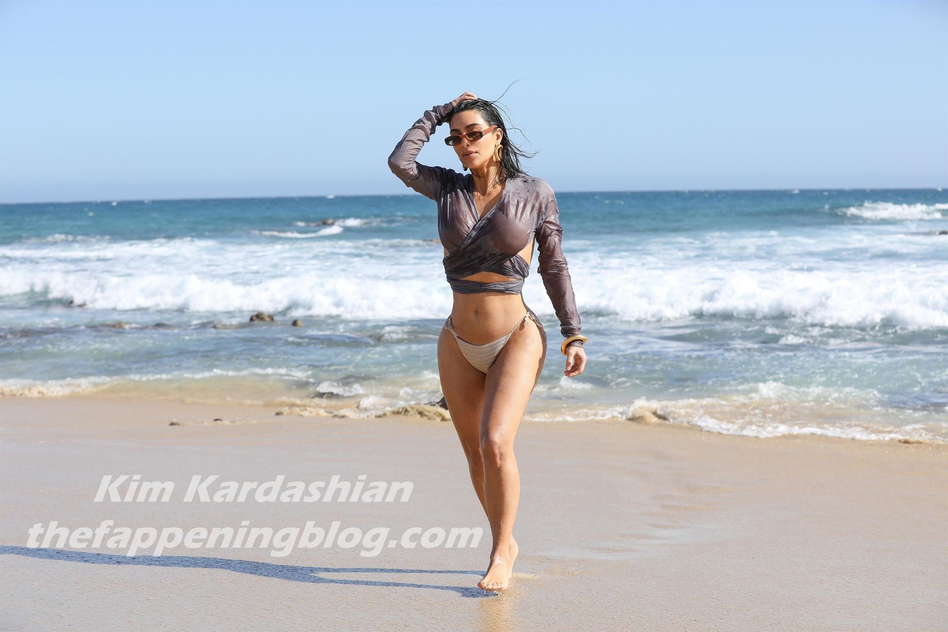 Kim Kardashian Puts on a Sultry Display on the Beach in Malibu (14 Photos)