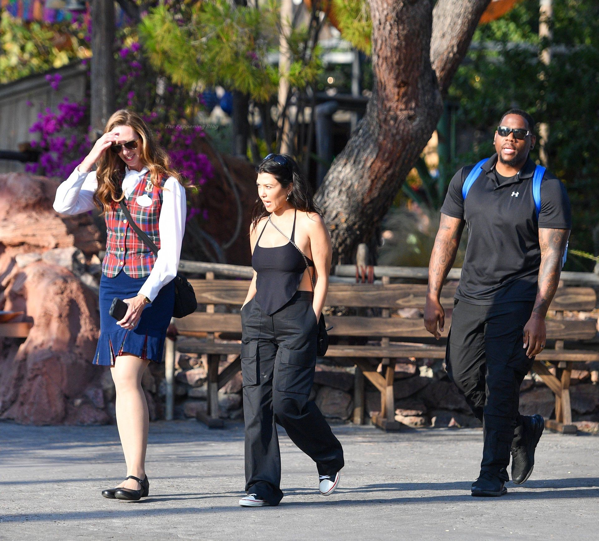 Kourtney Kardashian & Travis Barker Pack on Some PDA at Disneyland (14 Photos)