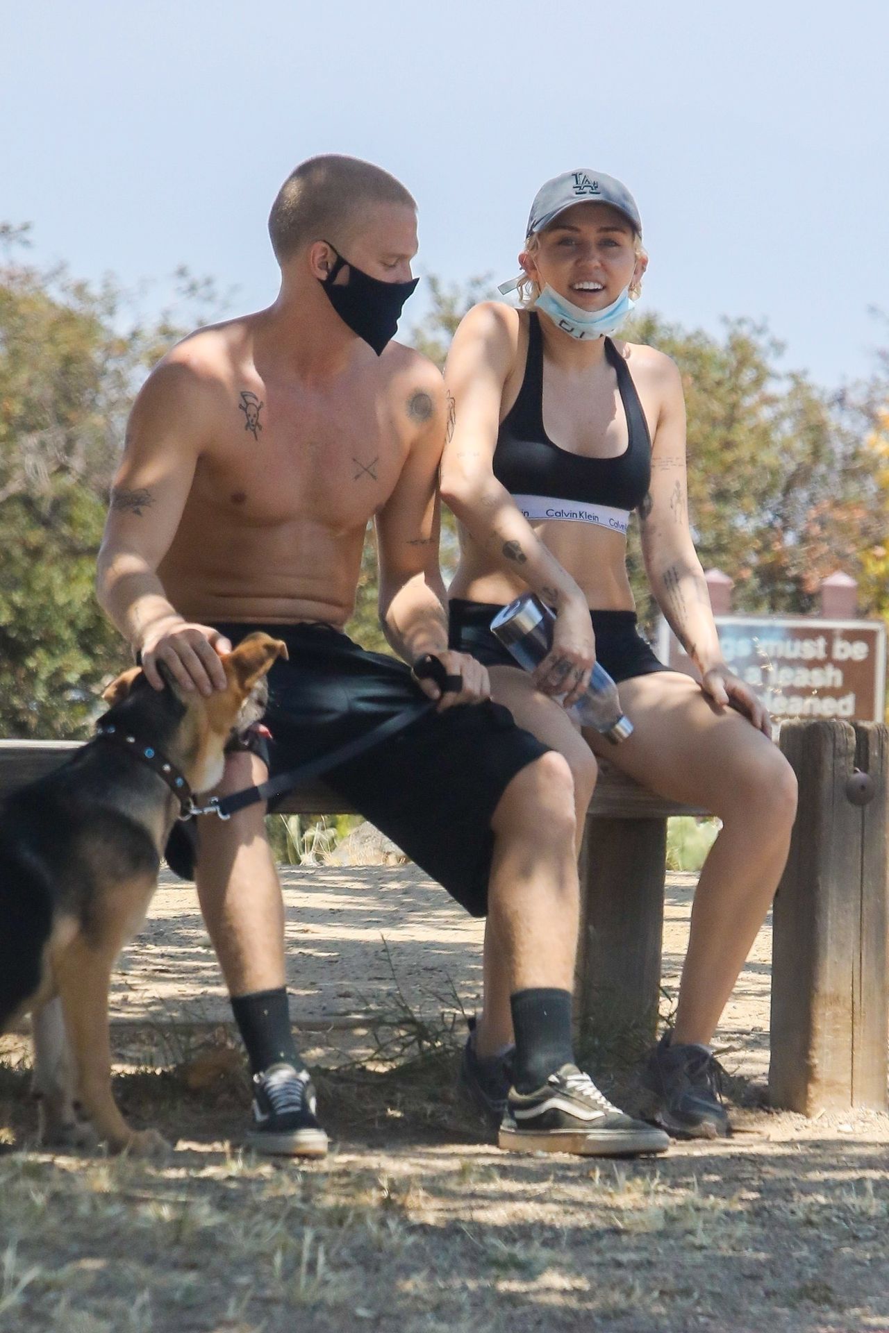 Miley Cyrus & Cody Simpson Walk with Their Dog (10 Photos)