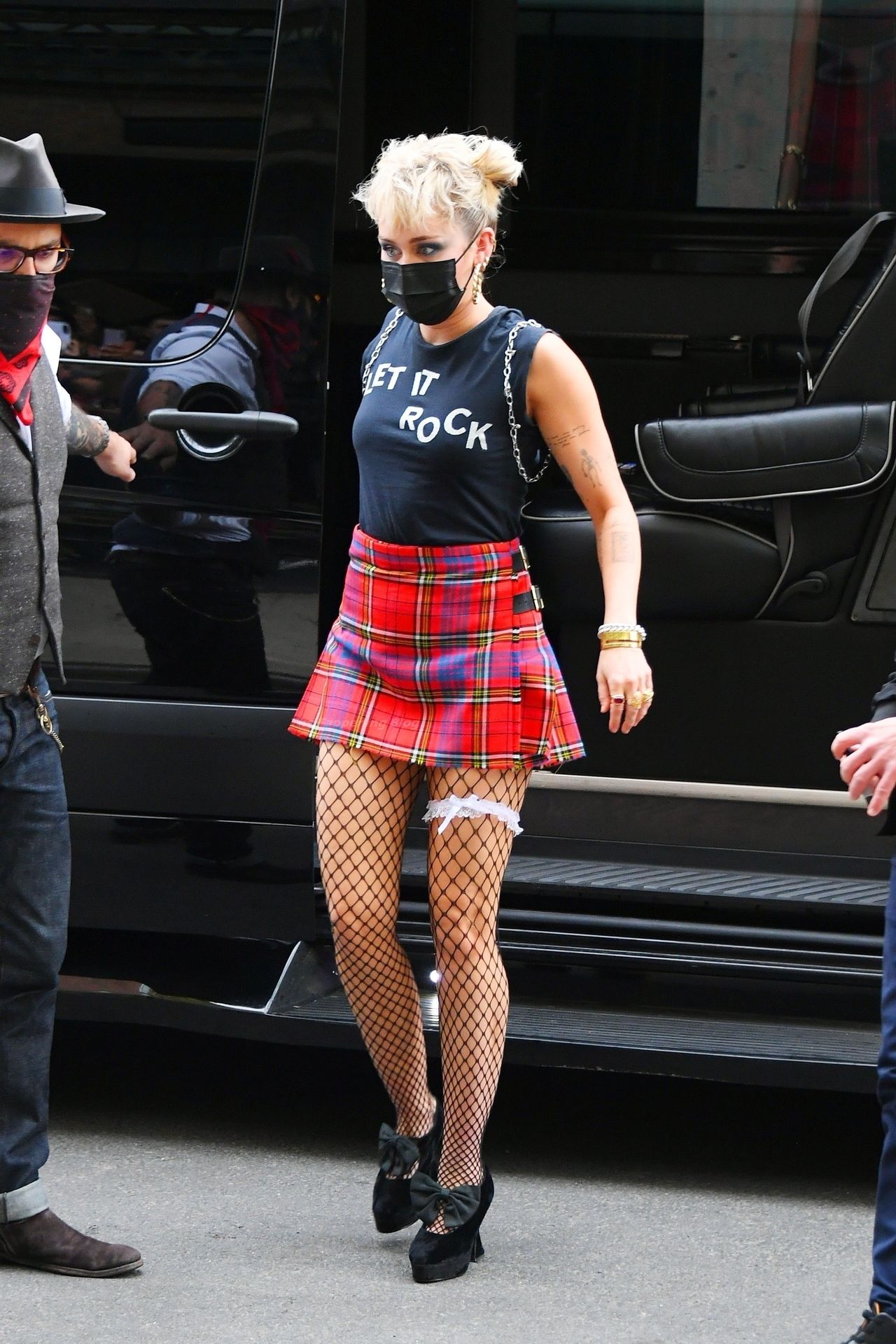 Miley Cyrus Grabs Attention in a Mini Skirt and Fishnets in NYC (22 Photos)