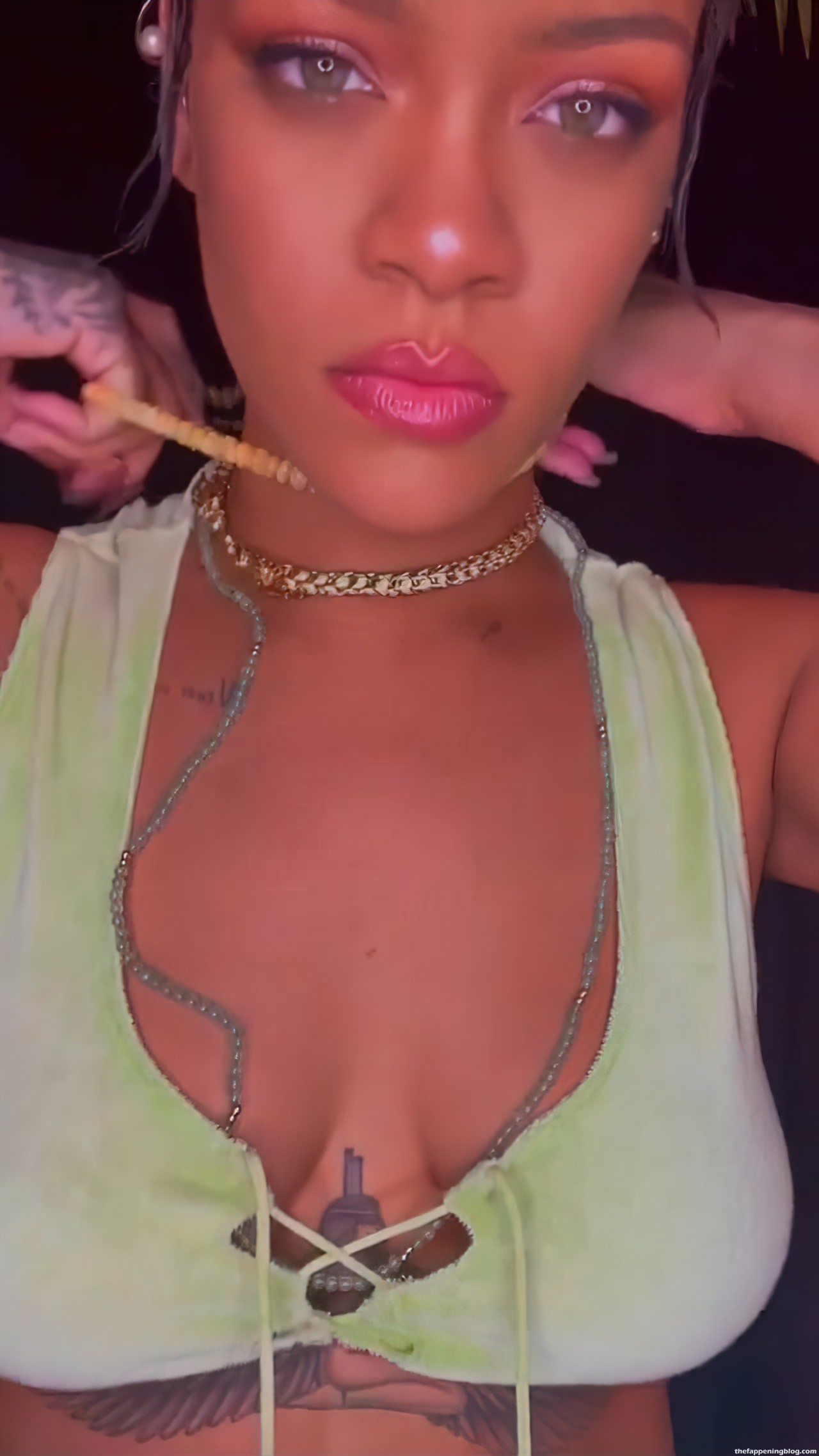 Rihanna Displays Her Tits and Butt in Green Lingerie (14 Pics + GIFs & Video)
