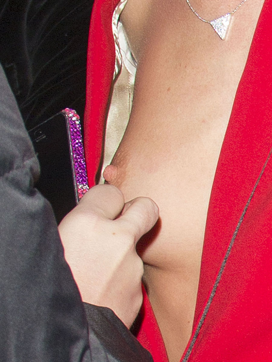 Rosie Huntington-Whiteleys Tit Flash in London (12 Photos)