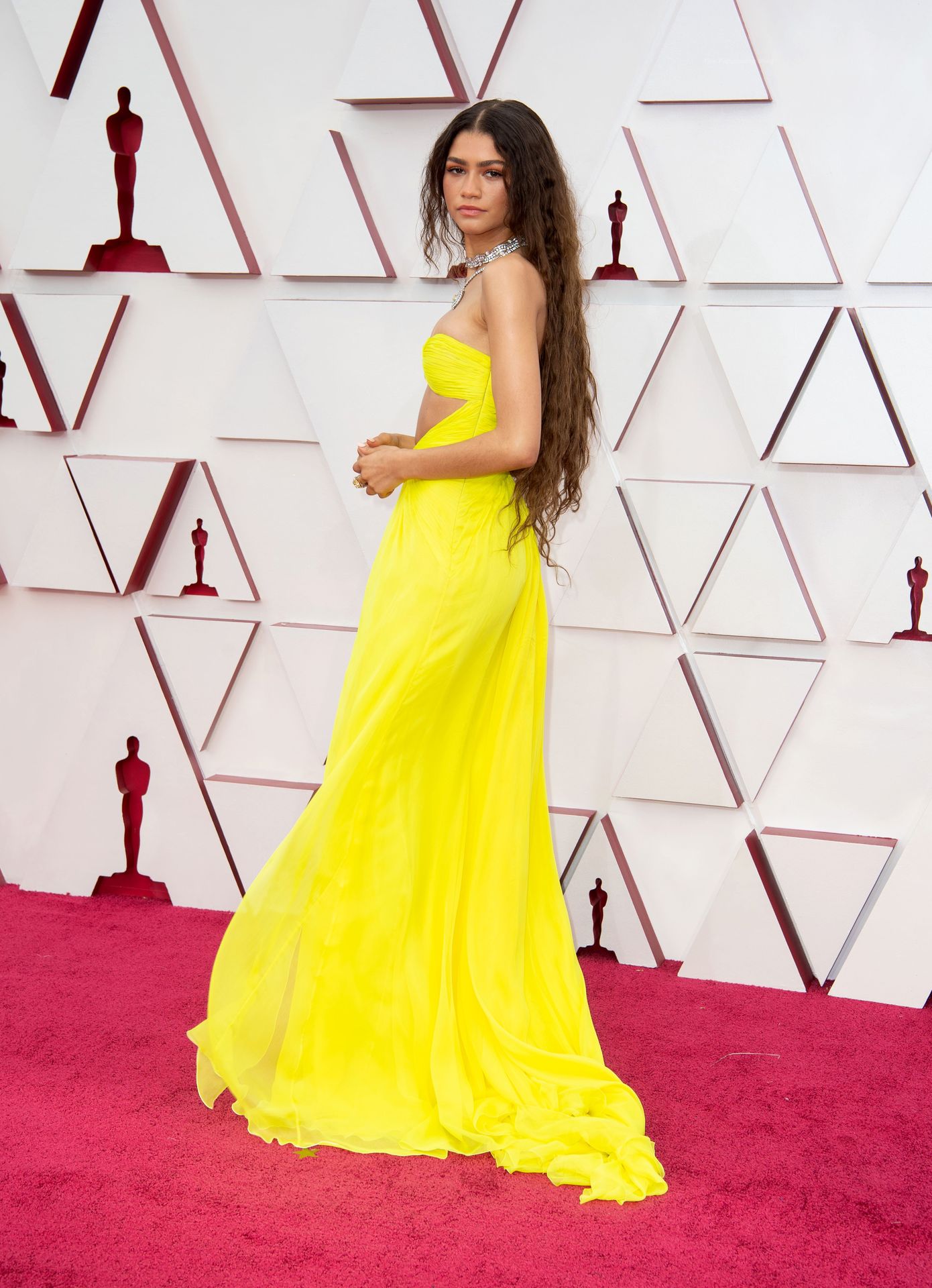 Zendaya Arrives at the Oscars Wearing a Mask and Long Yellow Gown (35 Photos)