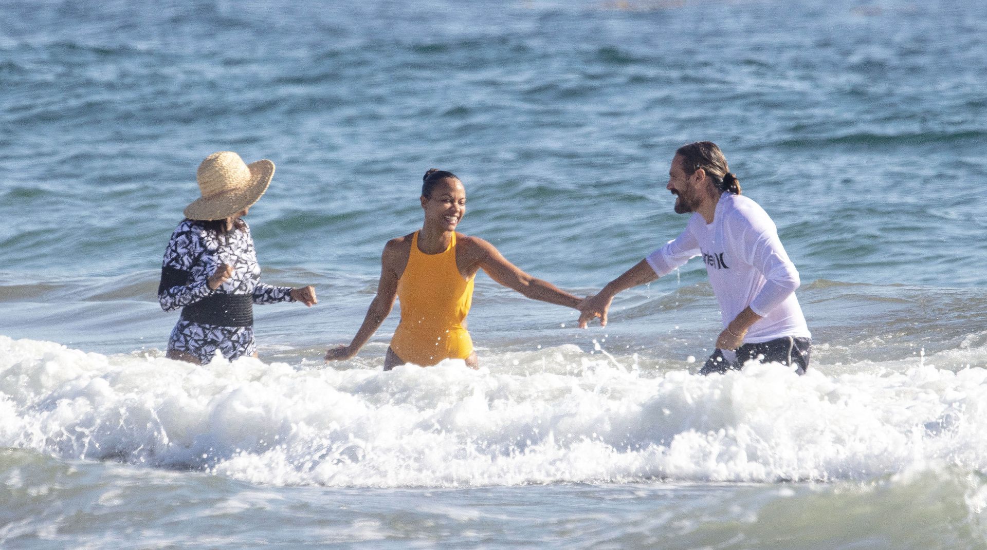 Zoe Saldana & Marco Perego Hold Hands as They Go for a Swim (47 Photos)